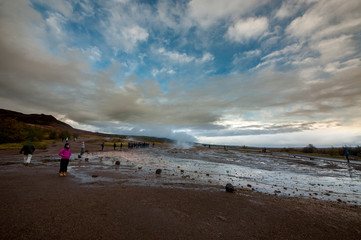 Strokkur (churn) fountain geyser in the geothermal area beside the Hv&iacute;t&aacute; River. Haukadalur, Geysir - Iceland
