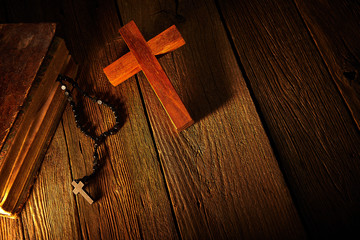 Christian cross on wood bible and rosary