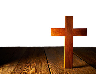 Christian wood cross on white background