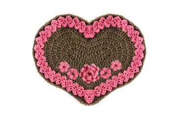 crochet Gingerbread heart shape valentines day gift with copy space on white isolated background