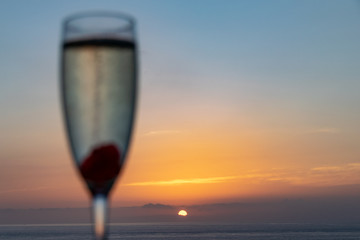 Evening celebrations as the sun sets over the Atlantic Ocean