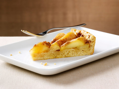 Slice of apple pie on plate
