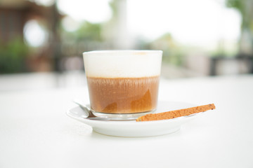 coffee latte art, coffee cup on the table cafe