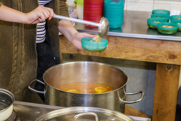 a dish is cooked in the kitchen