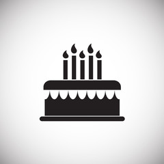 Cake with candles on white background icon