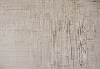 Textured putty close-up. Vintage or grunge background texture Venetian stucco in the pattern of the...
