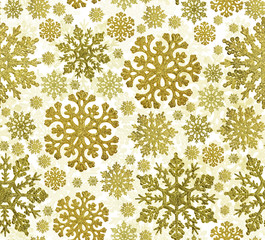 christmas seamless background from gold snowflakes