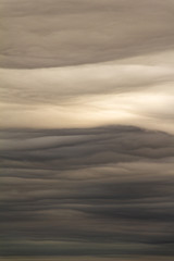 Fototapeta na wymiar Mystical clouds like drawn, Norilsk