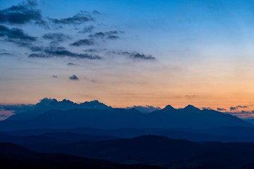 Scenic view of beautiful High Tatras mountains. Blue hour sunset with pink and blue tones, Slovakia.