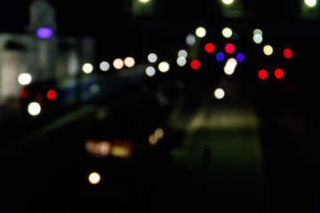 Abstract background of blurred city lights with bokeh effect