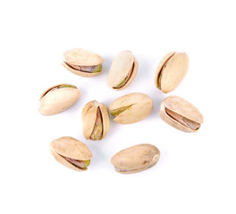 Pistachio nuts on a white background.