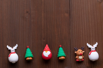 Cute Christmas Ornaments on wooden background
