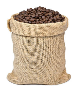Roasted coffee beans in a burlap sack. Sackcloth bag with coffee beans, isolated on white background. Coffee export.