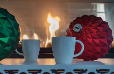Christmas coffee by the fire with decorations.
