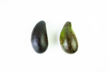 Raw avocado on white background.