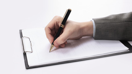 closeup.businessman signing a contract.photo with copy space.