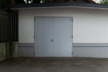 sidewalk by street wall & door