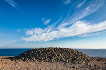 Obraz premium Cairn made of cobble deposits at Molen UNESCO Global Geopark Larvik Vestfold Norway Scandinavia