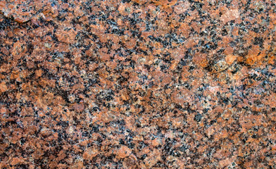 A part of marble tile with a black-and-red rattern