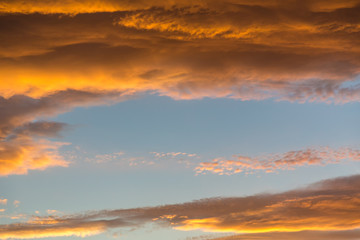 Vibrant orange and yellow sunset sky