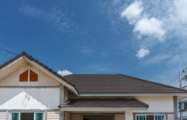 Roof house daytime with beautiful sky.