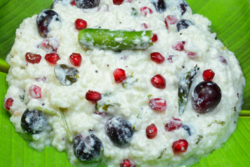 Curd rice is an Indian rice dish prepared with cooked white rice and yogurt. It is a famous dish in South India and eaten as part of lunch meal.