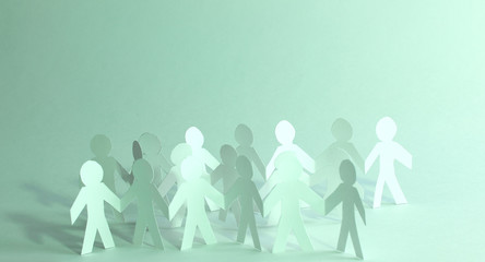 concept of teamwork.team paper men standing. photo with copy space.