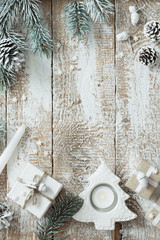 Christmas gifts on old wooden background