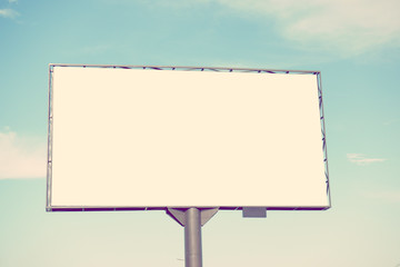 Mock up. Blank white billboard for outdoor advertising, marketing, sales against blue sky