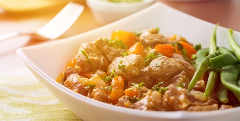 Tasty meat in white plate on light