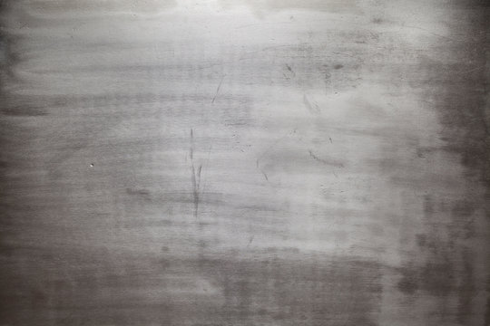 Scratched and damaged steel - grunge background or texture