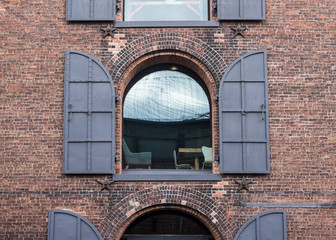 Old building with arch windows and bricks
