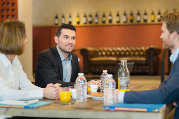 business people in restaurant