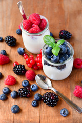 Healthy yougurt with mix berry, selective focus, the concept of a healthy Breakfast, diet food