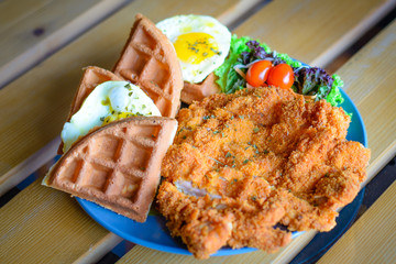 Chicken cutlet Waffle with Sunny Side Up Egg and salad