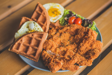 Chicken cutlet Waffle with Sunny Side Up Egg and salad
