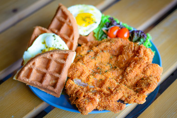Chicken cutlet Waffle with Sunny Side Up Egg and salad