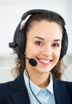 Portrait of adult woman working in call center