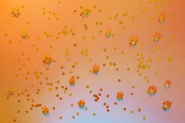 Festive yellow background with golden confetti and snow flakes