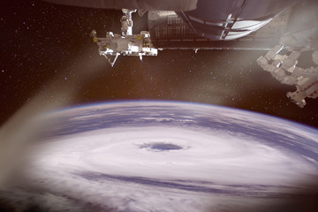 Hurricane eye, seen from the International Space Station, collage. Elements of this image are furnished by NASA.