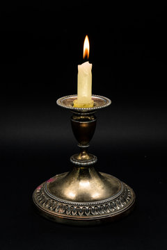 Candle holder isolated in dark background