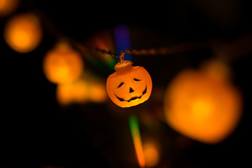 Halloween pumpkin garland glowing in the dark