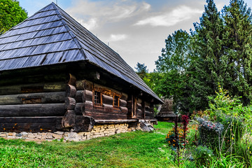 Fototapeta na wymiar Traditional house in precarpathian region in Ukraine of 19 century