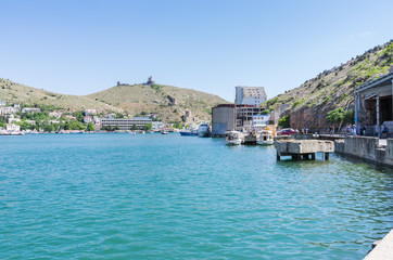 Harbor in the sea bay. Russia, Republic of Crimea, Balaclava. 11.06.2018: View of the Balaclava Bay