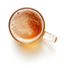 top view of mug of lager beef isolated on white background