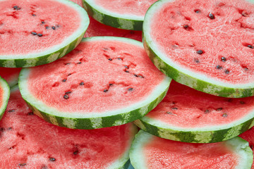 round slices of watermelon as background