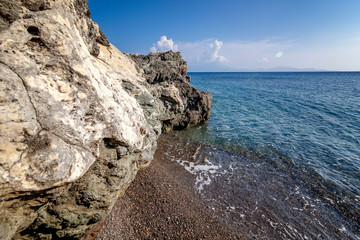 Stone rocky coast of the Mediterranean Sea, Kos island, Greece, beautiful landscape