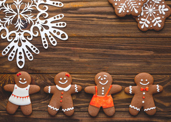 Christmas homemade gingerbread cookies and spices on the wooden