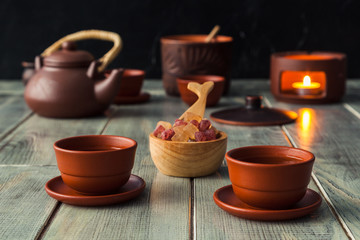 Tea ceremony, tea drinking with pottery. Concept of a cozy evening in a family restaurant