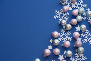 Christmas background with balls and snowflakes.